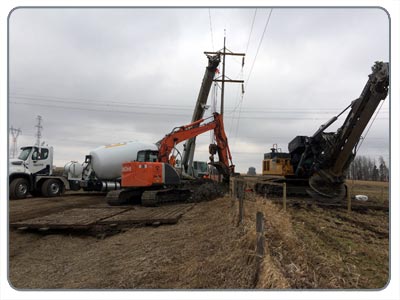 Concrete truck in place to pour the piling